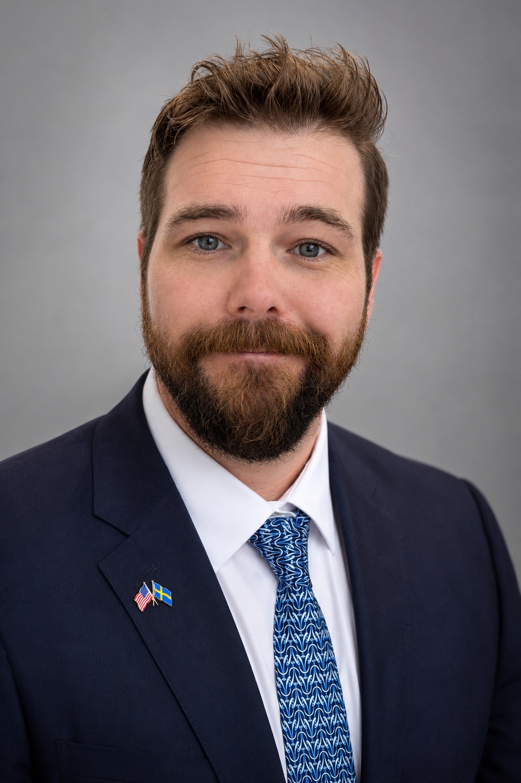 Professional headshot of Oskar Burman